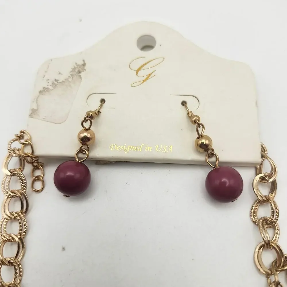 Glik's Burgundy Glass Bead Gold Tone Layered Bib Necklace Earrings Set Carded